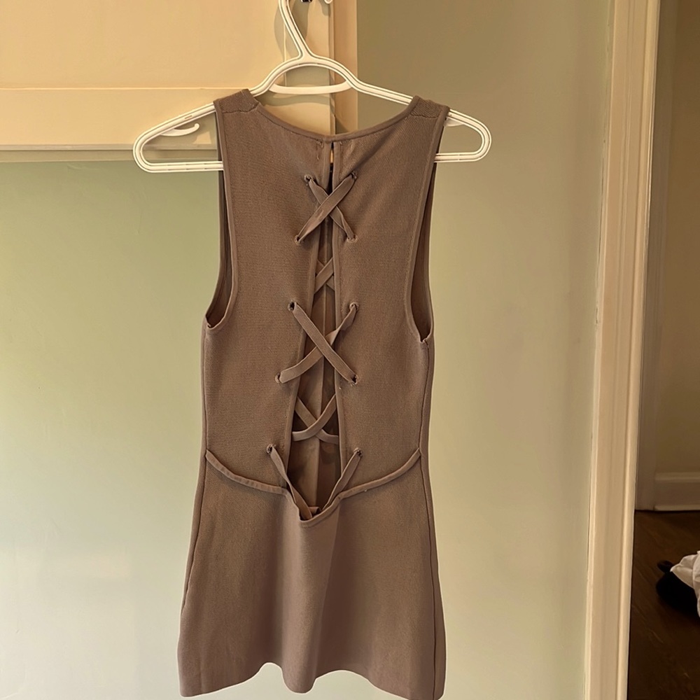 Ava Pull On Stretch Tunic Top With Criss Cross Tie Closure Back Opening